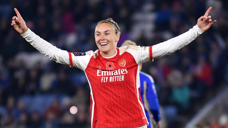 Caitlin Foord of Arsenal celebrates after scoring the team's third goal against Leicester