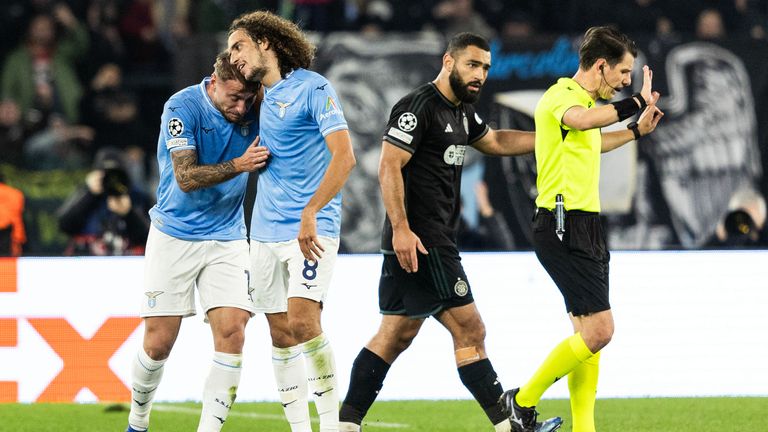 ROME, ITALY - NOVEMBER 28: Lazio's Ciro Immobile celebrates after he scores to make it 1-0 with Matteo Guendouzi whilst Celtic's Cameron Carter-Vickers complains to Referee Halil Umut Meler during a UEFA Champions League group stage match between S.S. Lazio and Celtic at Stadio Olimpico, on November 28, 2023, in Rome, Italy.  (Photo by Craig Foy / SNS Group)