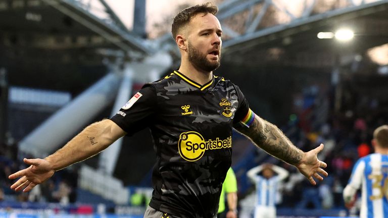 Adam Armstrong celebrates after giving Southampton the lead at Huddersfield