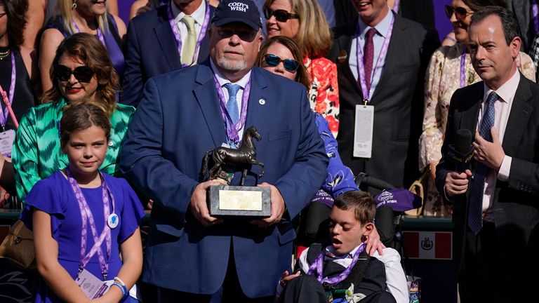 Cody Dorman with his father Kelly at Santa Anita after Cody's Wish's victory this year