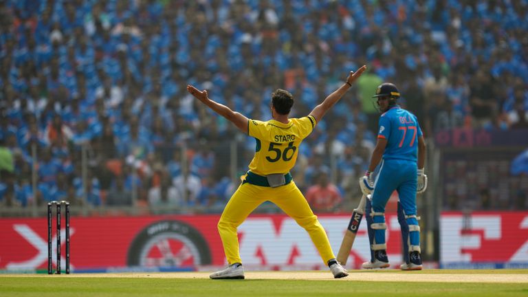 Australia&#39;s Mitchell Starc appeals unsuccessfully for the wicket of India&#39;s captain Rohit Sharma during the World Cup final 