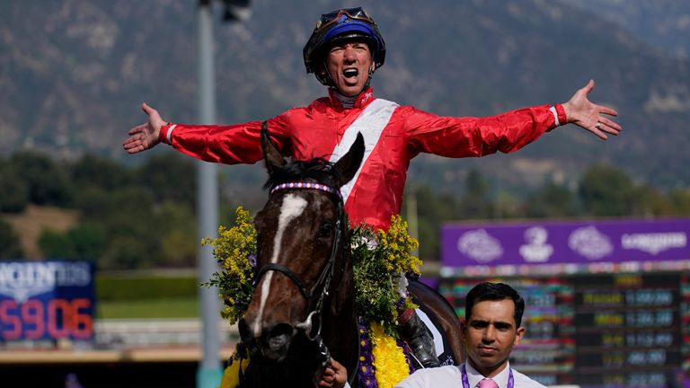 Frankie Dettori celebrates atop Inspiral after winning the Breeders' Cup Filly and Mare Turf 