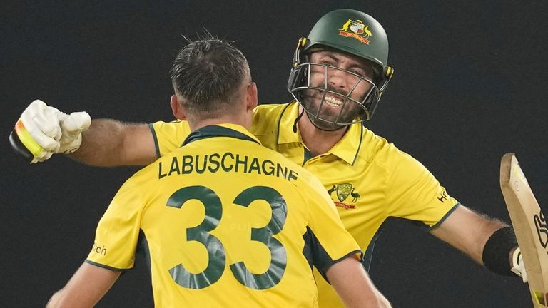 Australia's Glenn Maxwell and Marnus Labuschagne celebrate Australia's World Cup win (Associated Press)