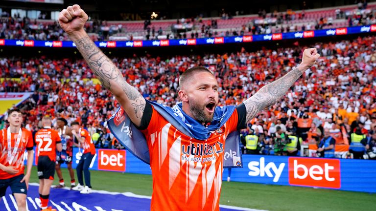 Henri Lansbury celebrates at Wembley after helping Luton win promotion to the Premier League