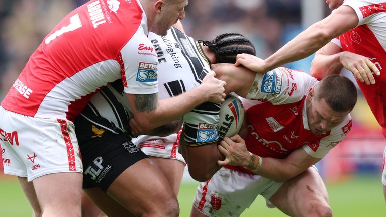 Picture by John Clifton/SWpix.com - 07/04/2023 - Rugby League - Betfred Super League Round 8 - Hull FC v Hull KR - MKM Stadium, Kingston upon Hull, England -
Hull FC's Chris Satae in action with Hull Kingston Rovers' Elliot Minchella, Jordan Abdull and James Batchelor