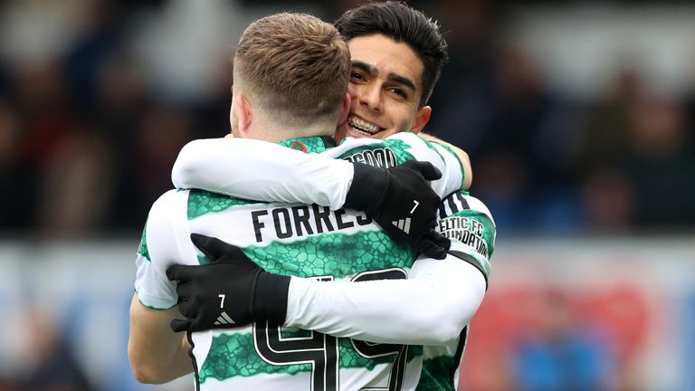 Celtic's James Forrest celebrates scoring their side's third goal of the game with team-mate Luis Palma during the cinch Premiership match at the Global Energy Stadium, Dingwall. Picture date: Saturday November 4, 2023.