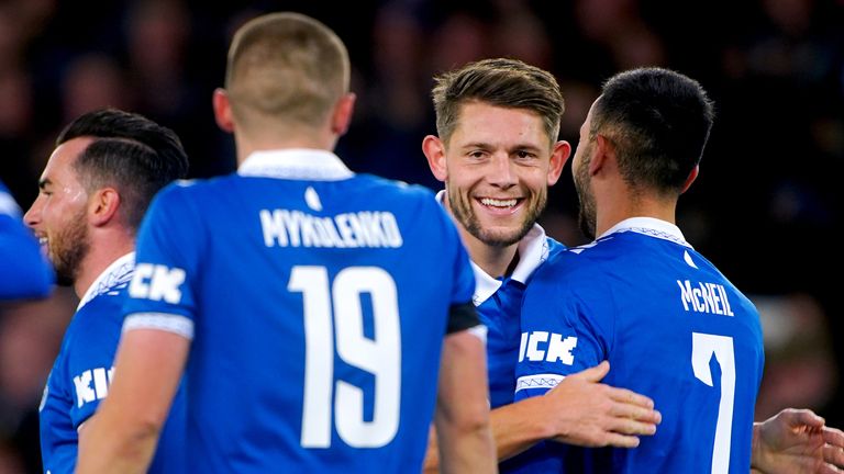 Everton's James Tarkowski celebrates with team-mates after scoring