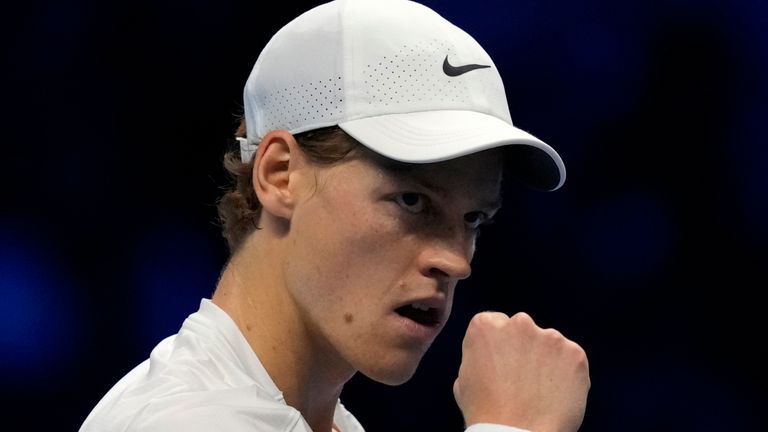 Italy's Jannik Sinner reacts during the singles tennis match against Greece's Stefanos Tsitsipas, of the ATP World Tour Finals at the Pala Alpitour, in Turin, Italy, Sunday, Nov. 12, 2023. (AP Photo/Antonio Calanni)