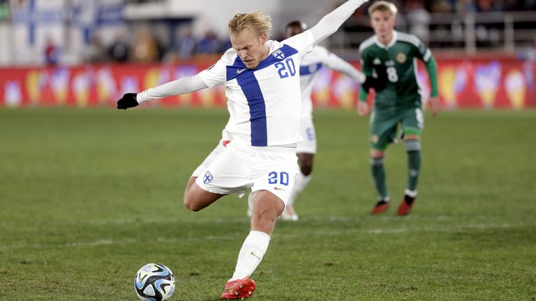 Joel Pohjanpalo of Finland scores during the Euro 2024 group H qualifying soccer match between Finland and Northern Ireland at the Olympic Stadium in Helsinki, Finland, Friday, Nov. 17, 2023. (Roni Rekomaa/Lehtikuva via AP)