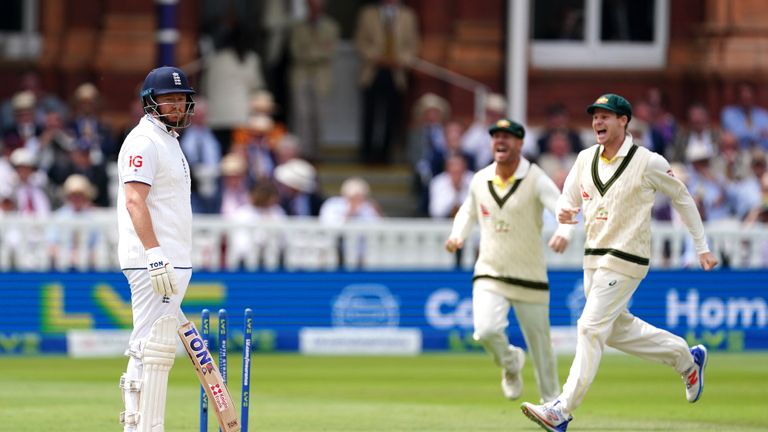 England&#39;s Jonny Bairstow (left) looks frustrated after being run out by Australia&#39;s Alex Carey (not pictured) as players celebrate during day five of the second Ashes test match at Lord&#39;s, London