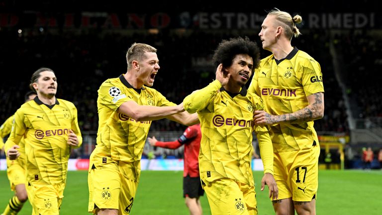 Karim Adeyemi sealed Borussia Dortmund's progress with the third goal in their 3-1 win at Milan