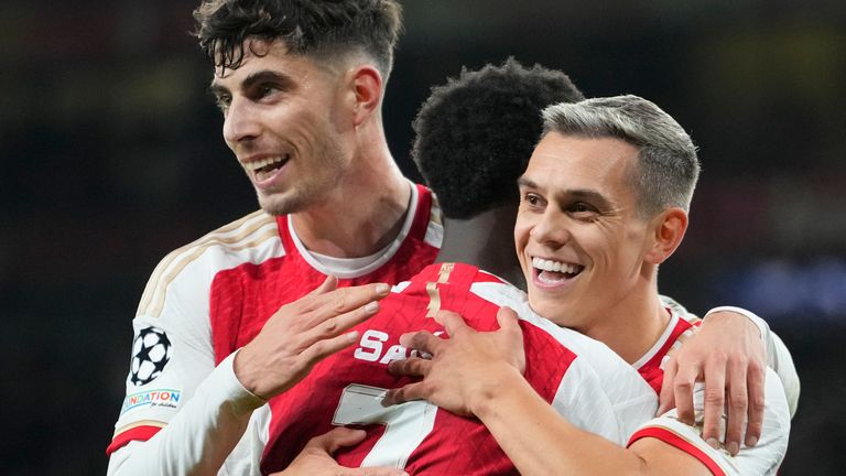 Arsenal's Leandro Trossard celebrates after scoring the opening goal during the Champions League Group B soccer match between Arsenal and Sevilla at Emirates stadium in London Wednesday, Nov. 8, 2023. (AP Photo/Kirsty Wigglesworth)