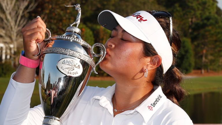 Lilia Vu, kisses the first place trophy after winning an LPGA golf tournament, Sunday, Nov. 12, 2023, in Belleair, Fla. (AP Photo/Scott Audette)