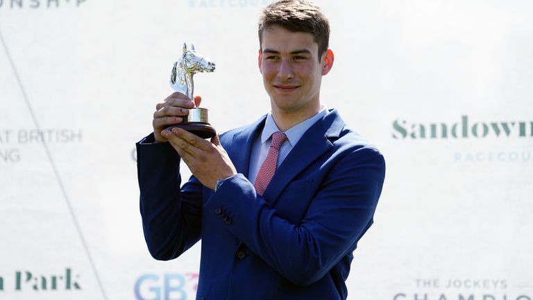 Luca Morgan with the champion conditional jockey trophy