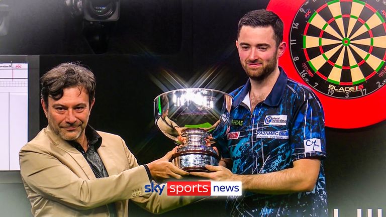 Luke Humphries celebrates winning the Grand Slam of Darts