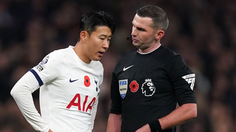 Heung-min Son talks to referee Michael Oliver
