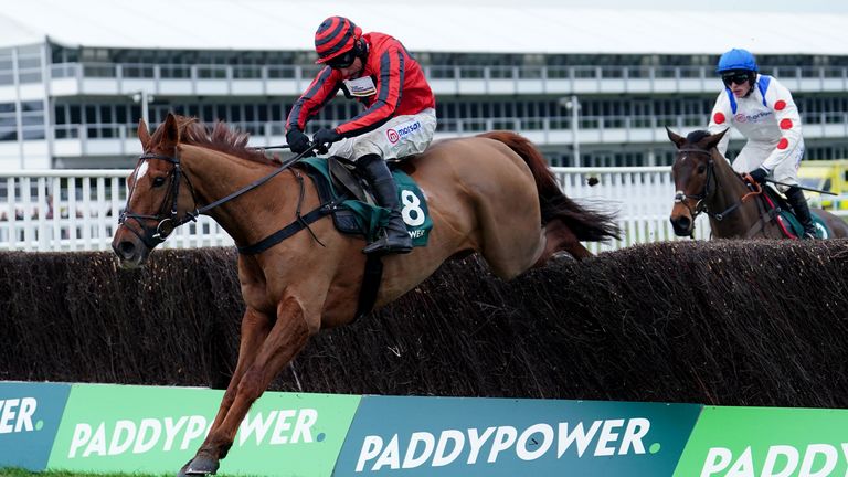 Midnight River ridden by Harry Skelton goes on to win The Paddy Power New Year&#39;s Day Handicap Chase at Cheltenham