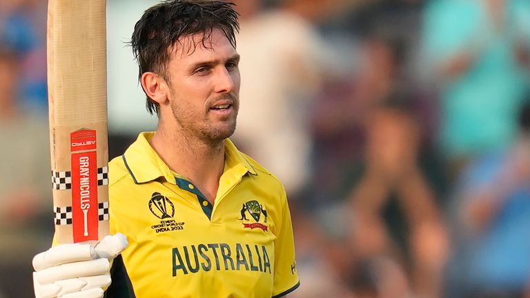 Australia&#39;s Mitchell Marsh celebrates his century during the ICC Men&#39;s Cricket World Cup match between Australia and Bangladesh in Pune, India, Saturday, Nov. 11, 2023. (AP Photo/Rafiq Maqbool)