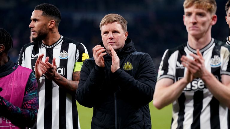 A stone-faced Eddie Howe applauds the fans