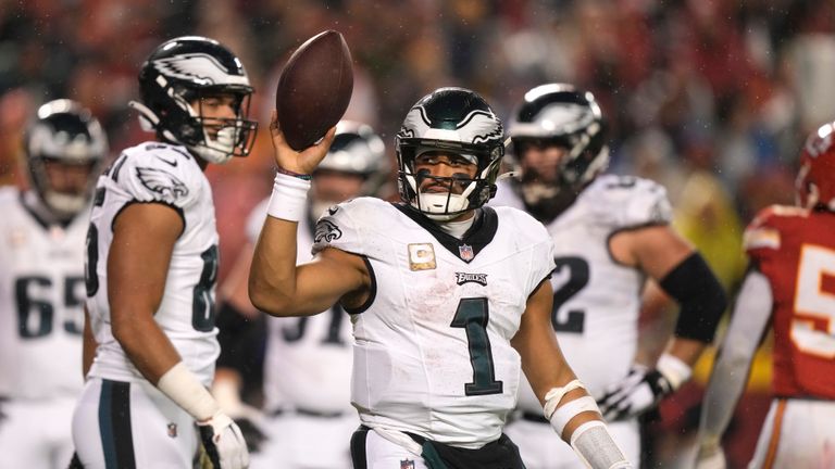 Philadelphia Eagles quarterback Jalen Hurts celebrates after scoring on a 1-yard run during the second half of an NFL football game against the Kansas City Chiefs, Monday, Nov. 20, 2023, in Kansas City, Mo.