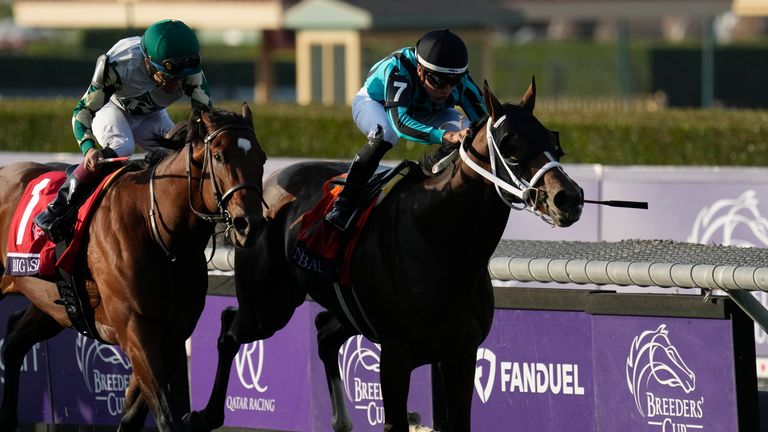 Gerardo Corrales rides Nobals, right, to win the Breeders' Cup Turf Sprint
