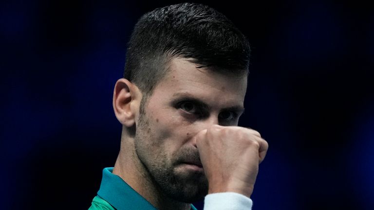 Serbia&#39;s Novak Djokovic reacts during the singles tennis match against Denmark&#39;s Holger Rune, of the ATP World Tour Finals at the Pala Alpitour, in Turin, Italy, Sunday, Nov. 12, 2023. (AP Photo/Antonio Calanni)