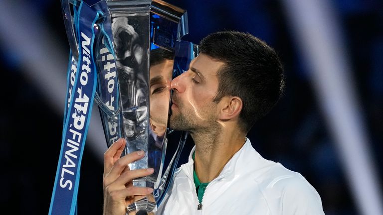 Serbia's Novak Djokovic poses with his trophy after defeating Norway's Casper Ruud 7-5, 6-3, in the singles final tennis match to win the ATP World Tour Finals at the Pala Alpitour, in Turin, Italy, Sunday, Nov. 20, 2022. (AP Photo/Antonio Calanni)