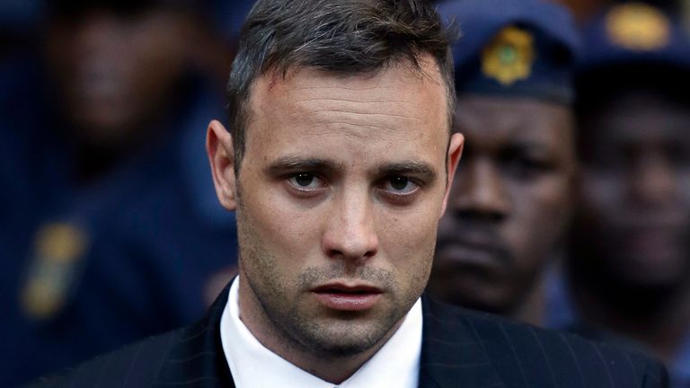 FILE - Oscar Pistorius leaves the High Court in Pretoria, South Africa, Wednesday, June 15, 2016, after his sentencing proceedings. Pistorius could be granted parole on Friday, Nov. 24, 2023 after nearly 10 years in prison for killing his girlfriend. The double-amputee Olympic runner was convicted of a charge comparable to third-degree murder for shooting Reeva Steenkamp in his home in 2013. He has been in prison since late 2014. (AP Photo/Themba Hadebe, File)