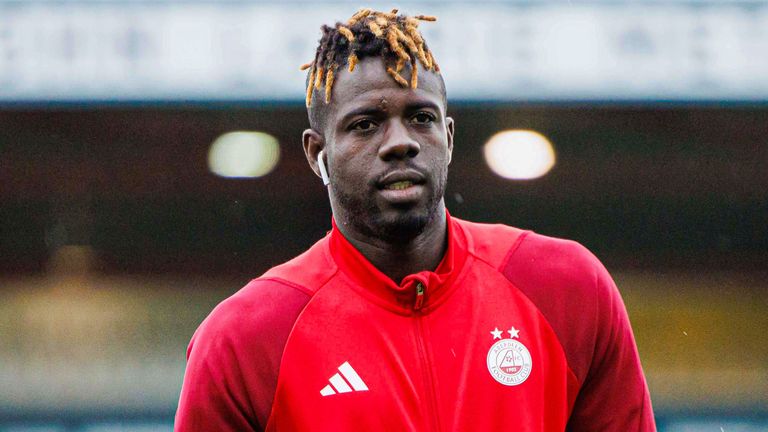 DINGWALL, SCOTLAND - SEPTEMBER 27: Aberdeen's Pape Gueye arrives during a Viaplay Cup Quarter-final match between Ross County and Aberdeen at the Global Energy Stadium, on  September 27, 2023, in Dingwall, Scotland. (Photo by Ross Parker / SNS Group)