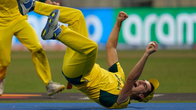 Australia&#39;s captain Pat Cummins celebrates the wicket of South Africa&#39;s wicketkeeper Quinton de Kock (Associated Press)