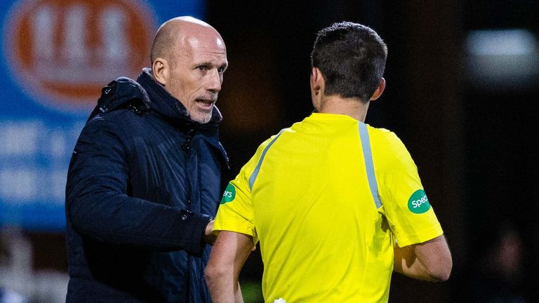 DUNDEE, SCOTLAND - NOVEMBER 01: Rangers Manager Philippe Clement speaks with Referee Kevin Clancy during a cinch Premiership match between Dundee FC and Rangers at The Scot Foam Stadium at Dens Park, on November 01, 2023, in Dundee, Scotland.  (Photo by Ross Parker / SNS Group)