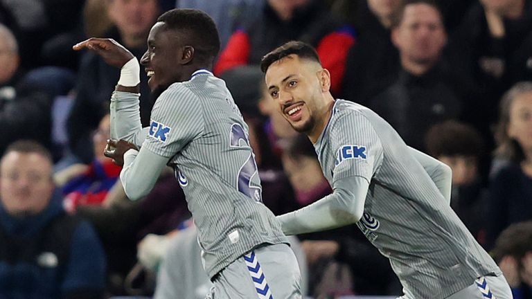Idrissa Gueye celebrates with team-mate Dwight McNeil after scoring a late goal for Everton against Crystal Palace