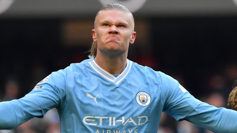 Erling Haaland celebrates after giving Man City a first-half lead against Liverpool