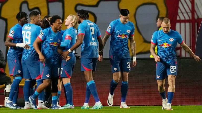 Leipzig's team players celebrate after Xavi Simons scored the opening goal during the Group G Champions League soccer match between Red Star Belgrade and RB Leipzig