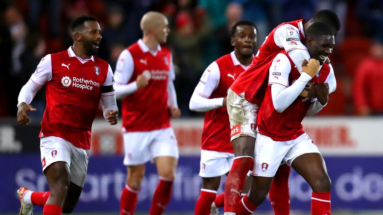 Rotherham United's Christ Tiehi (bottom right) celebrates with Hakeem Odoffin after scoring their side's second goal of the game during the Sky Bet Championship match at the AESSEAL New York Stadium, Rotherham. Picture date: Tuesday November 7, 2023.