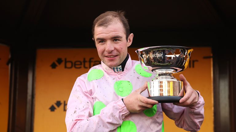 Chaelie Deutsch poses with the Betfair Chase trophy after Royale Pagaille's success