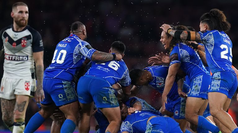 Samoa celebrate winning the Rugby League World Cup semi-final against England at the Emirates Stadium