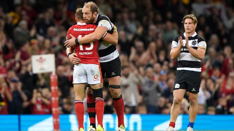 Wales' Leigh Halfpenny hugs Barbarians' Alun Wyn Jones as he is substituted off in his final appearance for the country at the Principality Stadium