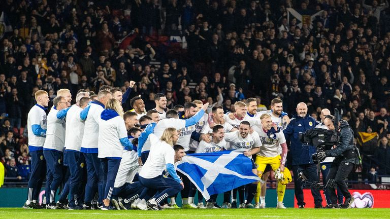The Scotland team celebrate qualifying for Euro 2024 