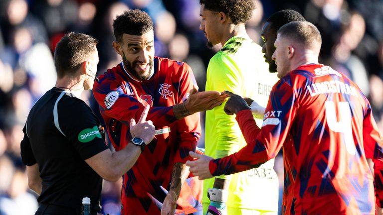 Connor Goldson argues with referee Steven MacLean after a Ross McCausland effort is ruled out