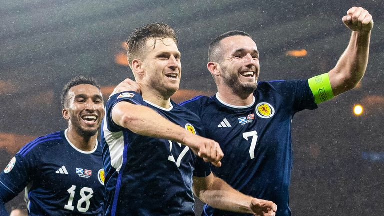 Scotland's Stuart Armstrong celebrates with John McGinn after scoring to make it 3-2 vs Norway