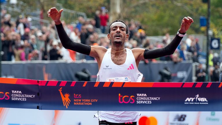 Ethiopia's&#160;Tamirat Tola set a course record to win the New York&#160;City Marathon men's race on Sunday