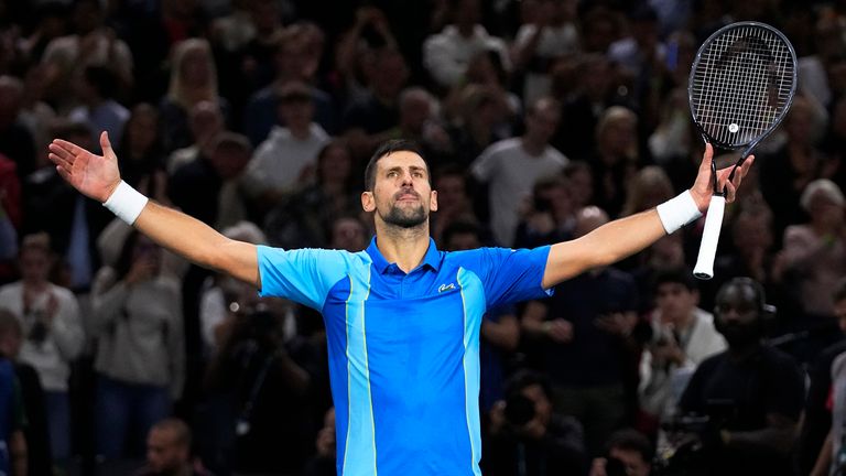 Serbia's Novak Djokovic celebrates after winning the quarter final match against Denmark's Holger Rune at the Paris Masters