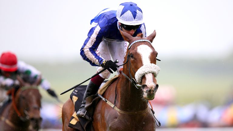 Teumessias Fox ridden by jockey Oisin Murphy on their way to winning the Howden Handicap at Newmarket
