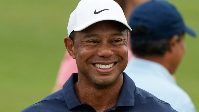 Tiger Woods smiles during a practice round of the Hero World Challenge PGA Tour at the Albany Golf Club, in New Providence, Bahamas, Wednesday, Nov. 29, 2023. (AP Photo/Fernando Llano)