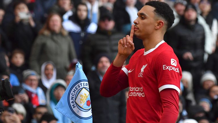 Liverpool&#39;s Trent Alexander-Arnold celebrates after scoring his side&#39;s opening goal during the English Premier League soccer match between Manchester City and Liverpool at Etihad stadium in Manchester, England, Saturday, Nov. 25, 2023. (AP Photo/Rui Vieira)