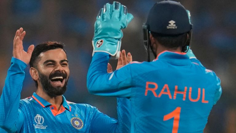 India's Virat Kohli, center, celebrates with teammate KL Rahul after the dismissal of Netherlands' captain Scott Edwards during the ICC Men's Cricket World Cup match between India and Netherlands in Bengaluru, India, Sunday, Nov. 12, 2023. (AP Photo/Aijaz Rahi)