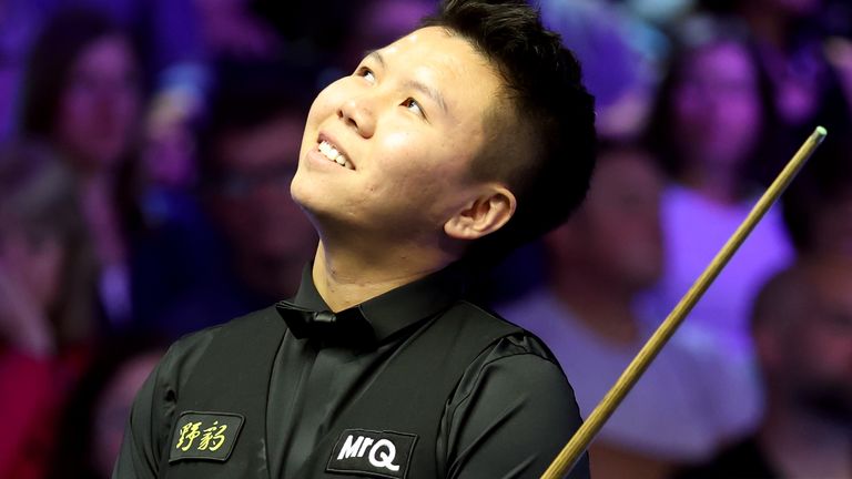 Zhou Yuelong during victory over John Higgins at UK Championship