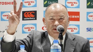 Eddie Jones gestures at his first press conference since being re-appointed as Japan's head coach (Kyodo via AP Images)