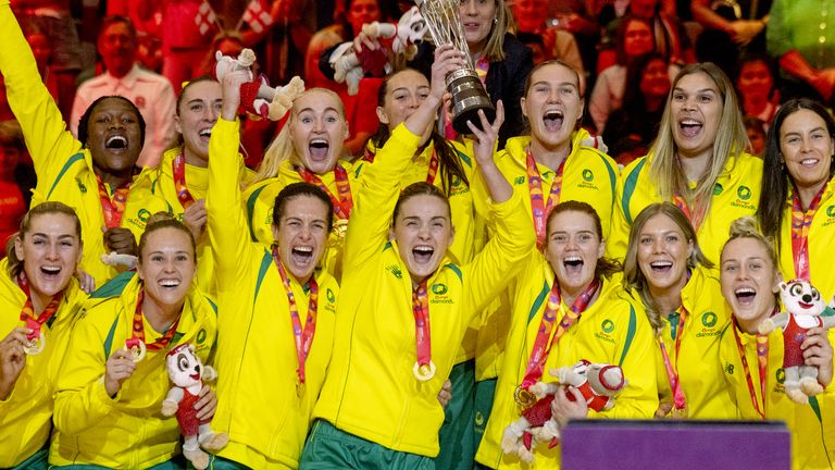 Australia celebrate with the trophy after the 2023 Netball World Cup final at the Cape Town…
